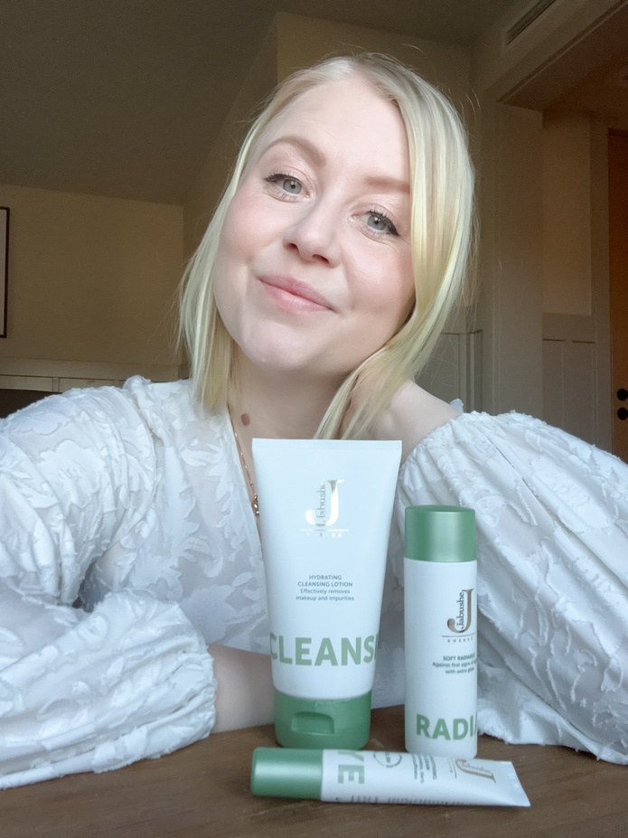 Joanna sharing skincare products in a bright room